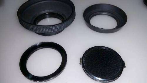 Various 49mm set. Hoods, filters, step-up, cap. - Late listing!