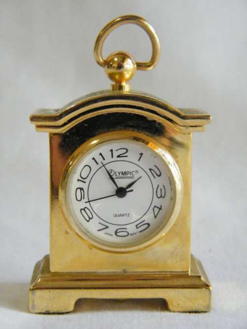 Olympic quarts small clock - as per photo