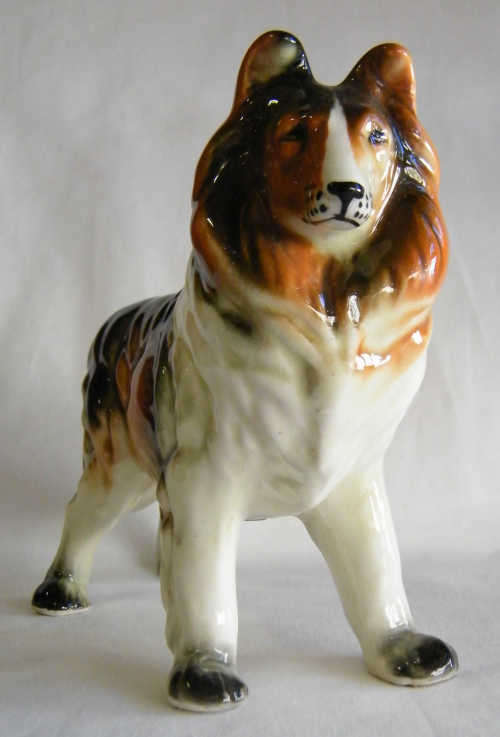 Porcelain Dog statue - as per photo