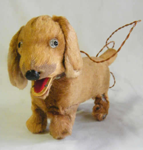 Vintage tin & fur remote controlled dog - working but needs some work - as per photo