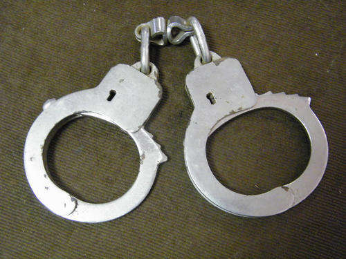 Pair of handcuffs - no key - as per photo