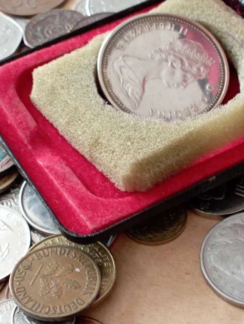 World Coins 200+ including Canadian silver dollar as per scan Shipping in description