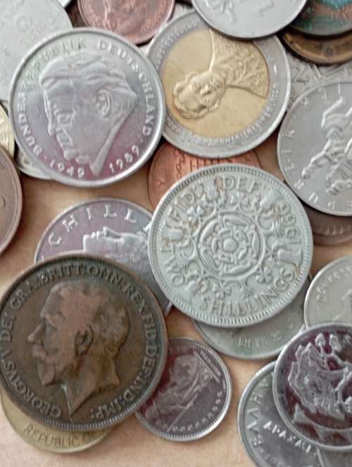 World Coins 200+ including Canadian silver dollar as per scan Shipping in description