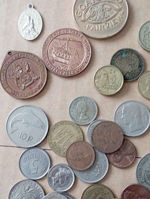 World Coins 200+ including Canadian silver dollar as per scan Shipping in description