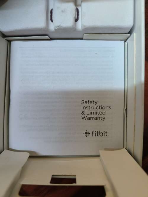 FITBIT FLYER WIRELESS HEADPHONES - WHITE AND BRONZE