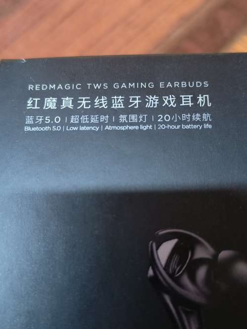 REDMAGIC TWS GAMING EARBUDS - BLACK WITH FLASHING RED LIGHTS.