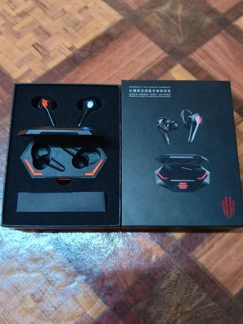 REDMAGIC TWS GAMING EARBUDS - BLACK WITH FLASHING RED LIGHTS.