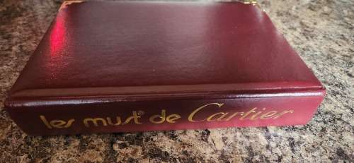 LE Must de Cartier Handbook in Leather binding