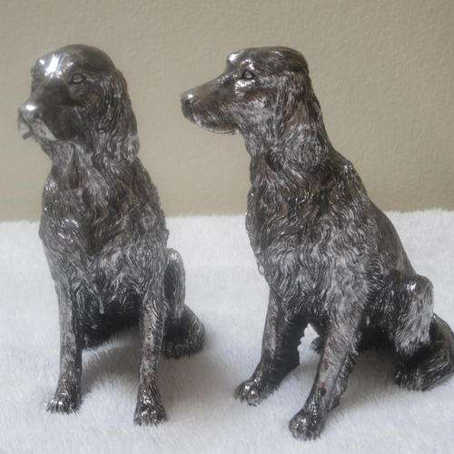Set of two antique silver dogs