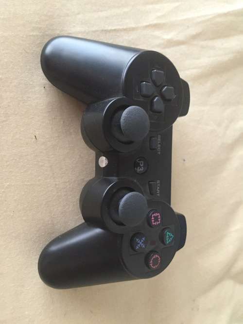 Playstation 3 w/ 2x remotes & games incl.