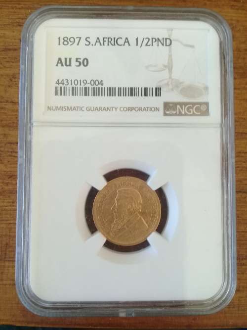Paul Kruger ZAR : GOLD HALF POND of 1897 : NGC graded AU 50