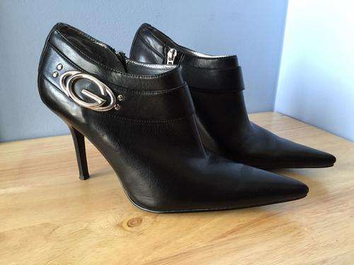 Stunning Guess black stiletto heel leather ankle boots size 7.5