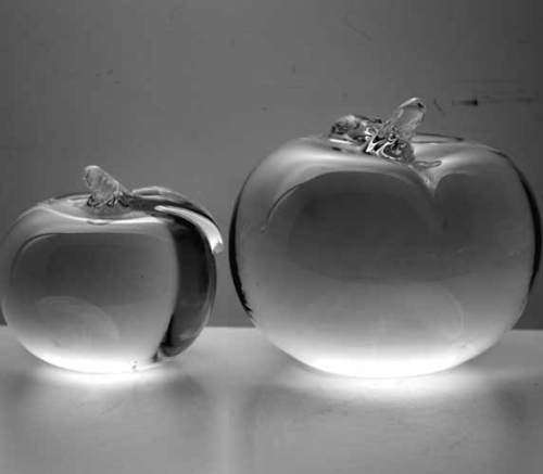 * SIMON PEARCE (IRISH-AMERICAN) TWO MAGNIFICENT PAPERWEIGHTS OF CLEAR GLASS, THE LARGER ONE SIGNED *