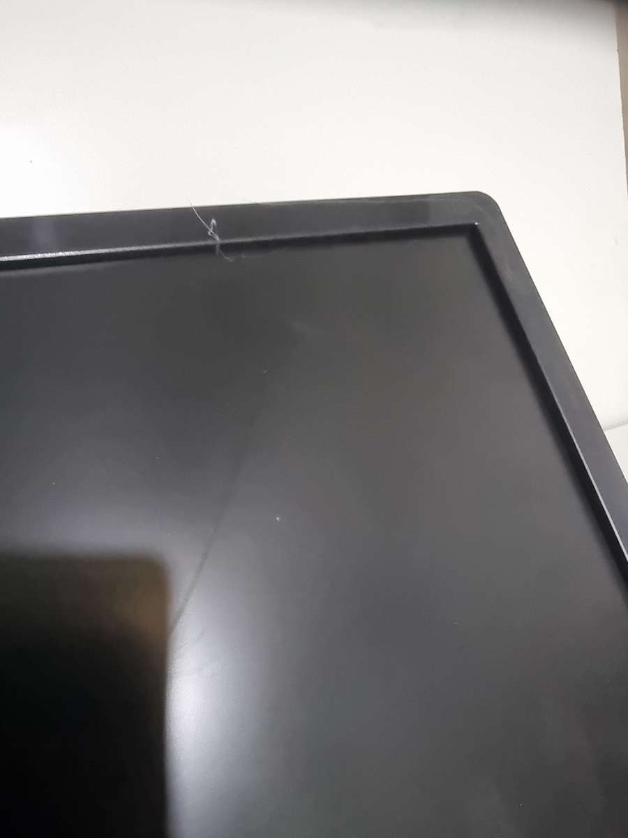 Philips 18.5 inch LED monitor - badly scratched - no stand but has Vesa mount