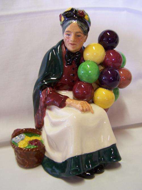 ROYAL DOULTON. "The Old Balloon Seller" H.N 1315