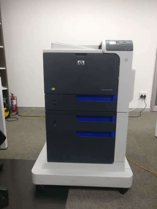 HP Color LaserJet Enterprise CP4025dn with Paper Feeder and Cabinet (NO RESERVE)