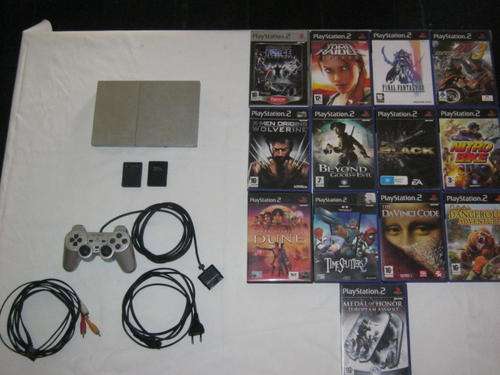 Silver Sony PlayStation PS2 & thirteen assorted games!