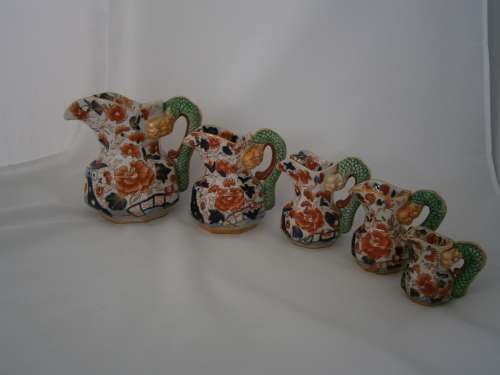 5 X GRADUATED IRONSTONE CHINA DRAGON JUG SET