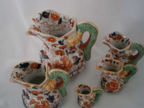 5 X GRADUATED IRONSTONE CHINA DRAGON JUG SET