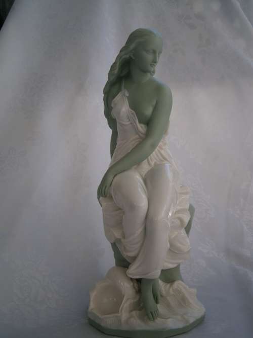 Minton part Glased and green tinted parian Figure  `MIiranda`, late 19th century