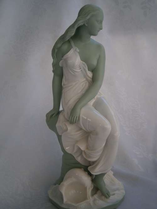 Minton part Glased and green tinted parian Figure  `MIiranda`, late 19th century