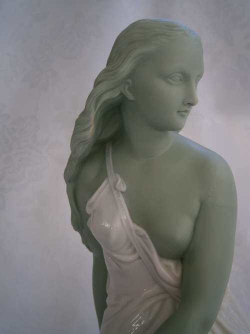 Minton part Glased and green tinted parian Figure  `MIiranda`, late 19th century
