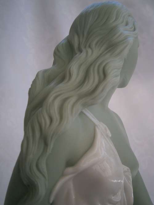 Minton part Glased and green tinted parian Figure  `MIiranda`, late 19th century