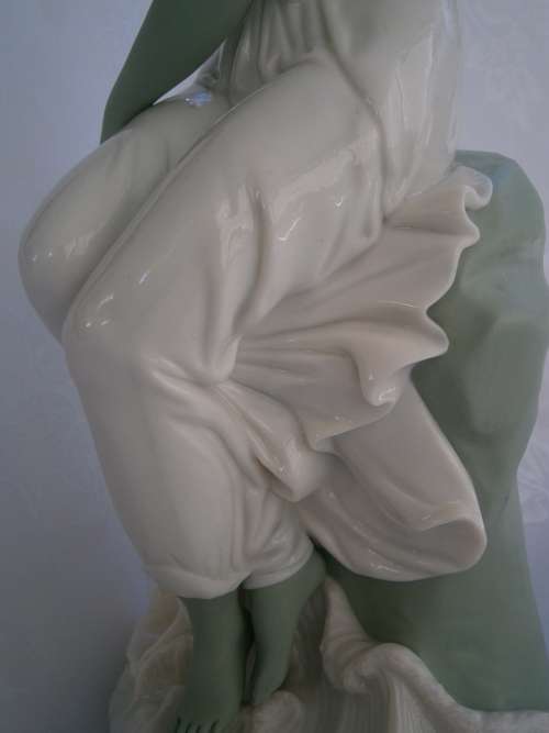 Minton part Glased and green tinted parian Figure  `MIiranda`, late 19th century