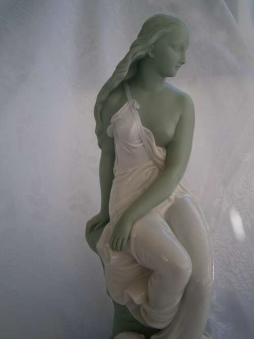 Minton part Glased and green tinted parian Figure  `MIiranda`, late 19th century