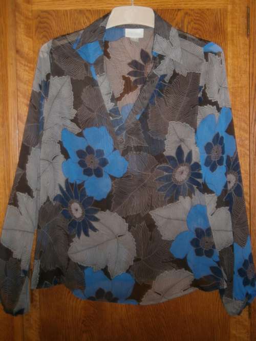 Long sleeve blouse by Caviar in size 12