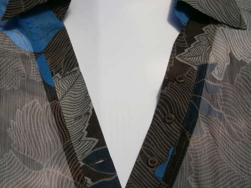 Long sleeve blouse by Caviar in size 12