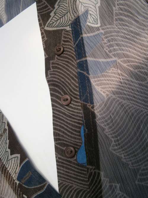 Long sleeve blouse by Caviar in size 12