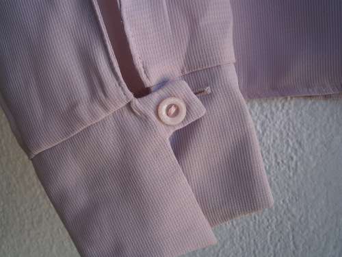 Longsleeve blouse by Woolworth in size 12