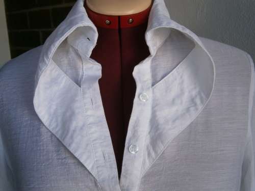 Stylish  long sleeve blouse with interesting collar  in size M