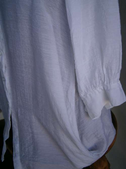 Stylish  long sleeve blouse with interesting collar  in size M