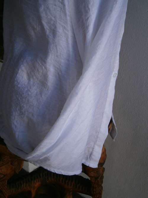 Stylish  long sleeve blouse with interesting collar  in size M