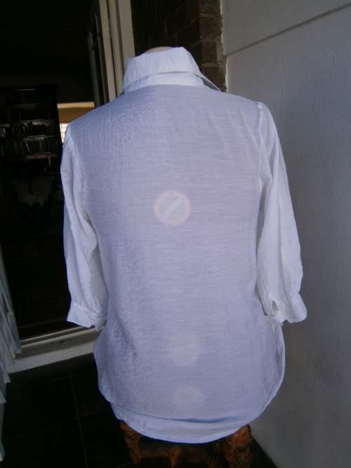 Stylish  long sleeve blouse with interesting collar  in size M