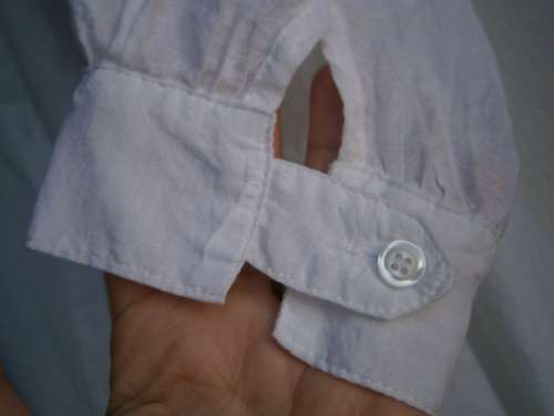 Stylish  long sleeve blouse with interesting collar  in size M