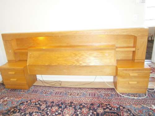 Large Oak Headboard for queen size bed with two bedside tables and a compartment for beddings.