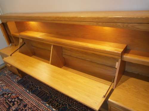 Large Oak Headboard for queen size bed with two bedside tables and a compartment for beddings.