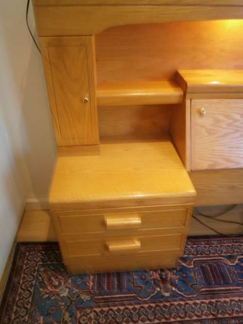 Large Oak Headboard for queen size bed with two bedside tables and a compartment for beddings.