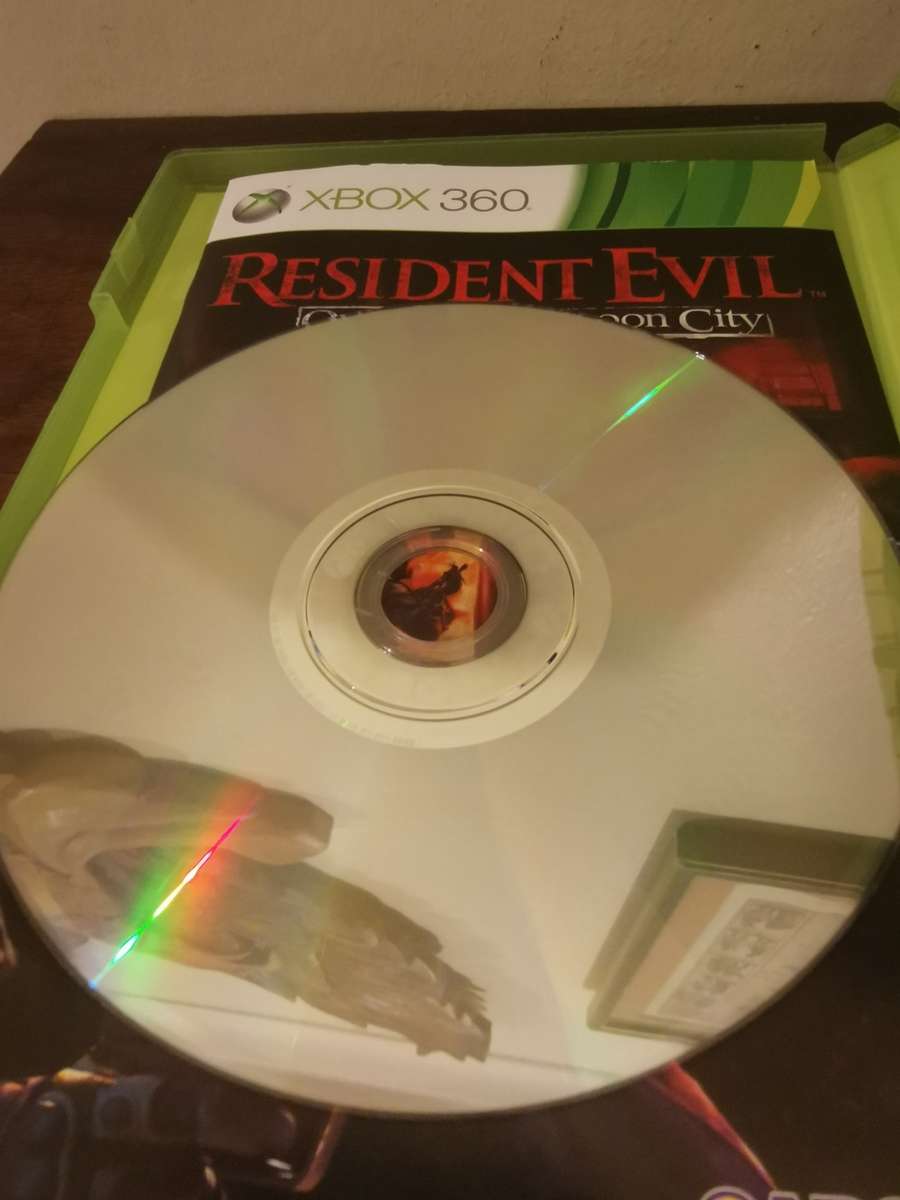 Resident Evil: Operation Raccoon City on Xbox 360 with booklet