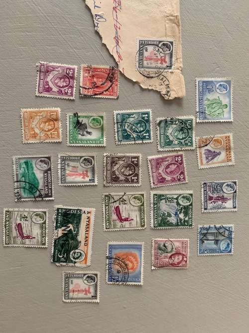 **OLD STAMP COLLECTION FROM ALL AROUND THE WORLD**