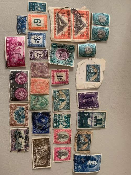 **OLD STAMP COLLECTION FROM ALL AROUND THE WORLD**