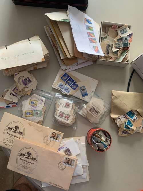**OLD STAMP COLLECTION FROM ALL AROUND THE WORLD**