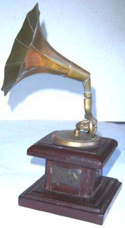 A Miniature model of an old gramophone.
