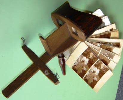 A stereo viewer with 15 photographs.