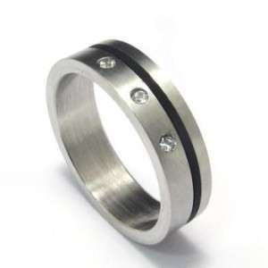 BFA - STAINLESS STEEL WEDDING BAND WITH THREE ACCENT CZ STONES - SIZE 7