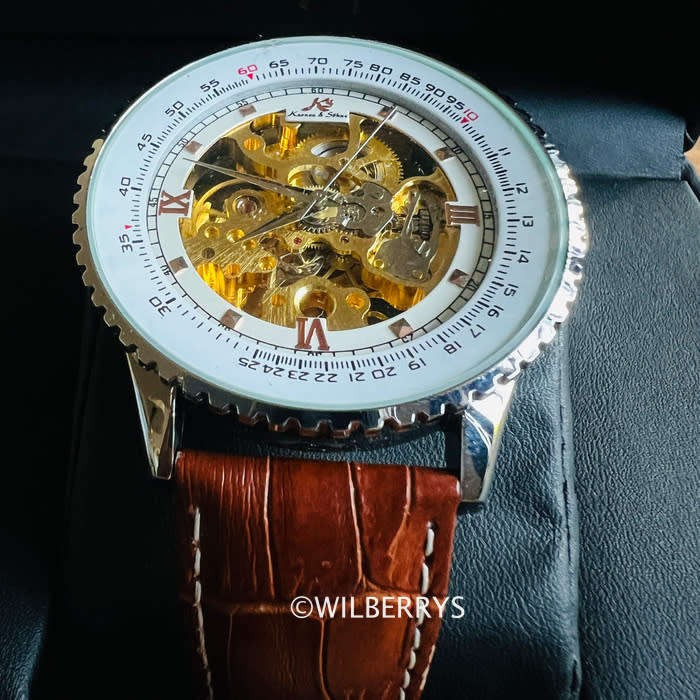 Kinetic skeleton watch sale