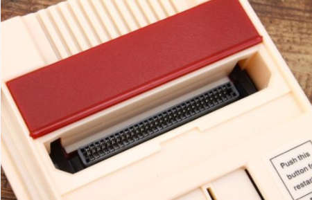 Retro gaming console with controls and 152 games.